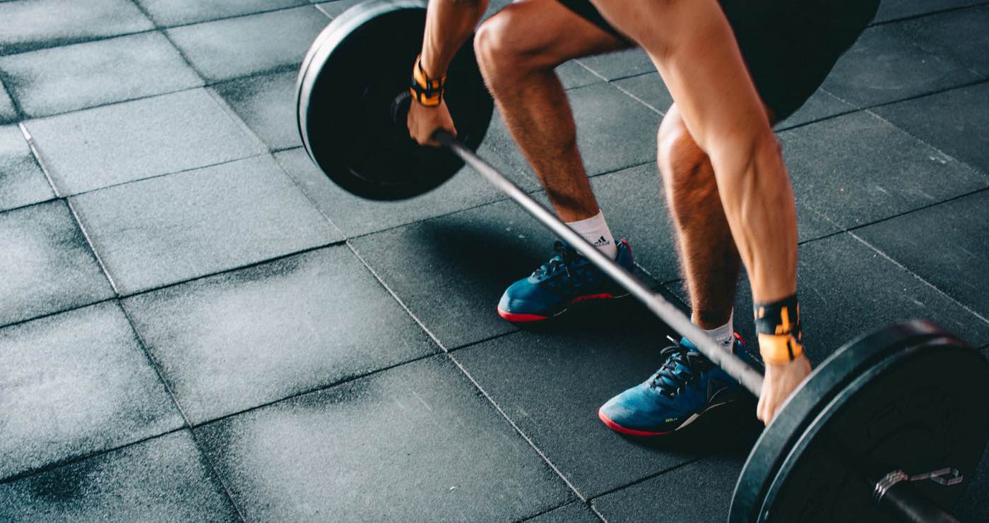 Hintergrundbild von einem Fitness in Erlangen Trainingsszenario mit einer Langhantel